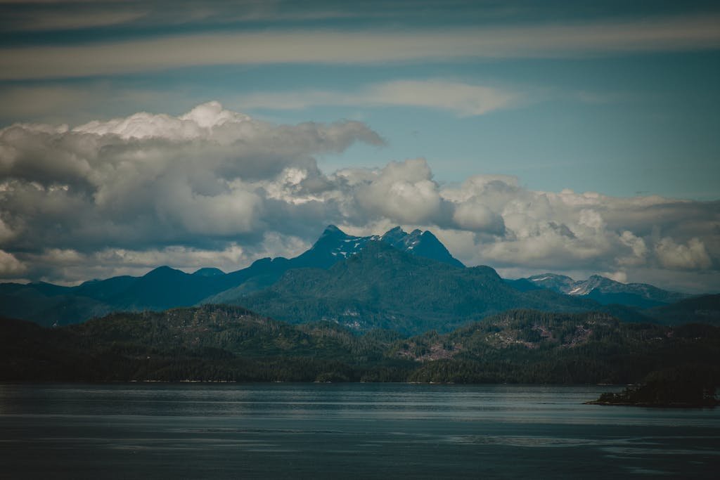 Majestic Alaskan Peaks Under Dramatic Skies