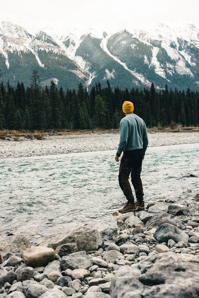Man Near a River in Kootenay National Park in Canada